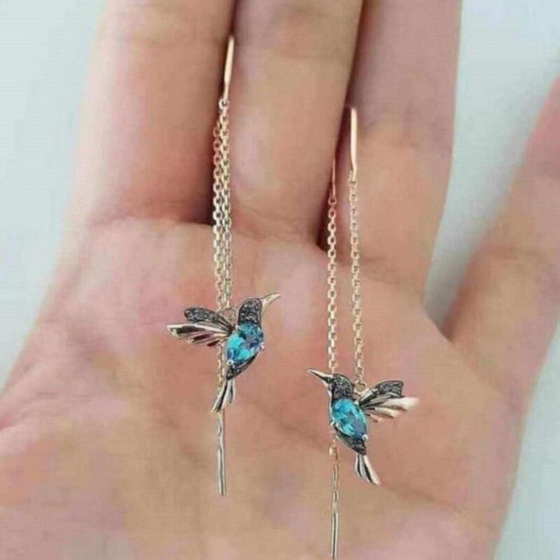 Shay - Orecchini colibrì con zirconi