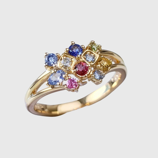 Anello in oro con cristallo colorato