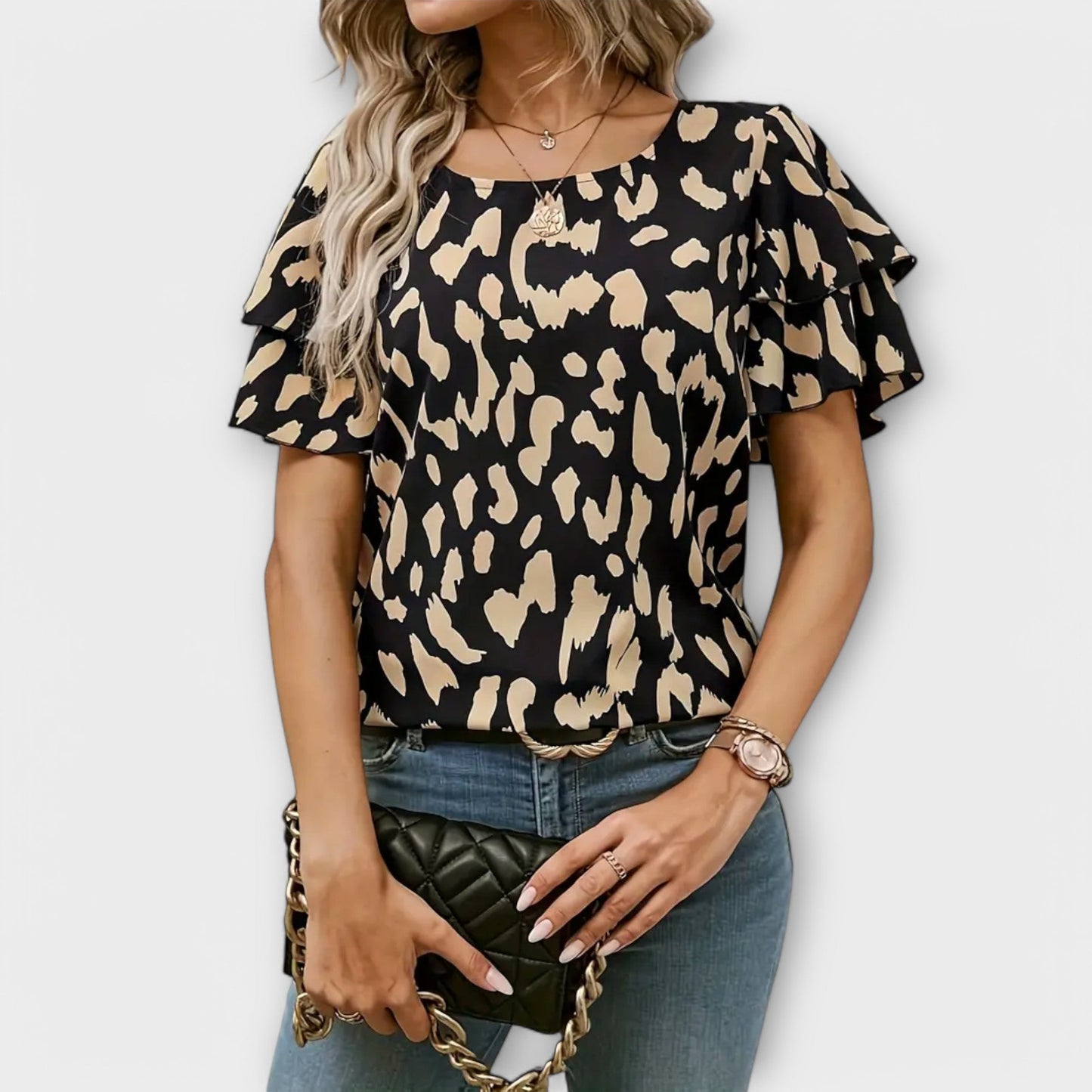 Lela - Blusa elegante con maniche leopardate