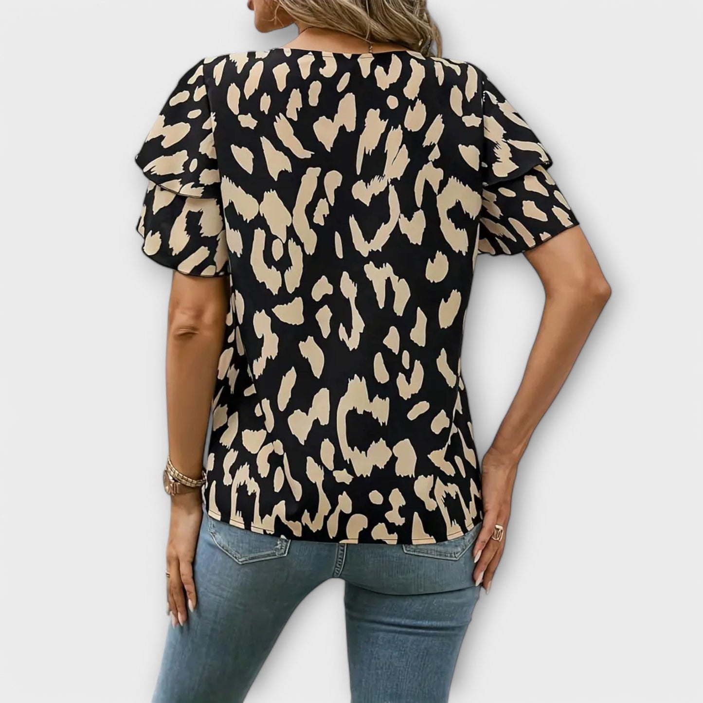 Lela - Blusa elegante con maniche leopardate