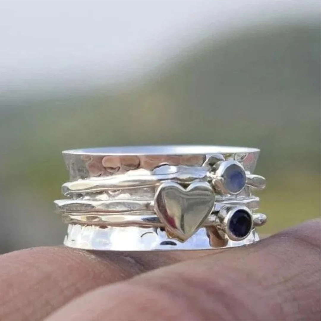 Anello elegante a forma di cuore rotante in argento sterling
