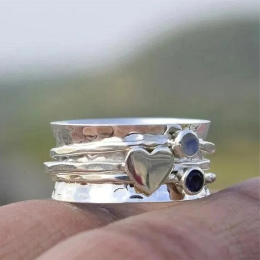 Anello elegante a forma di cuore rotante in argento sterling